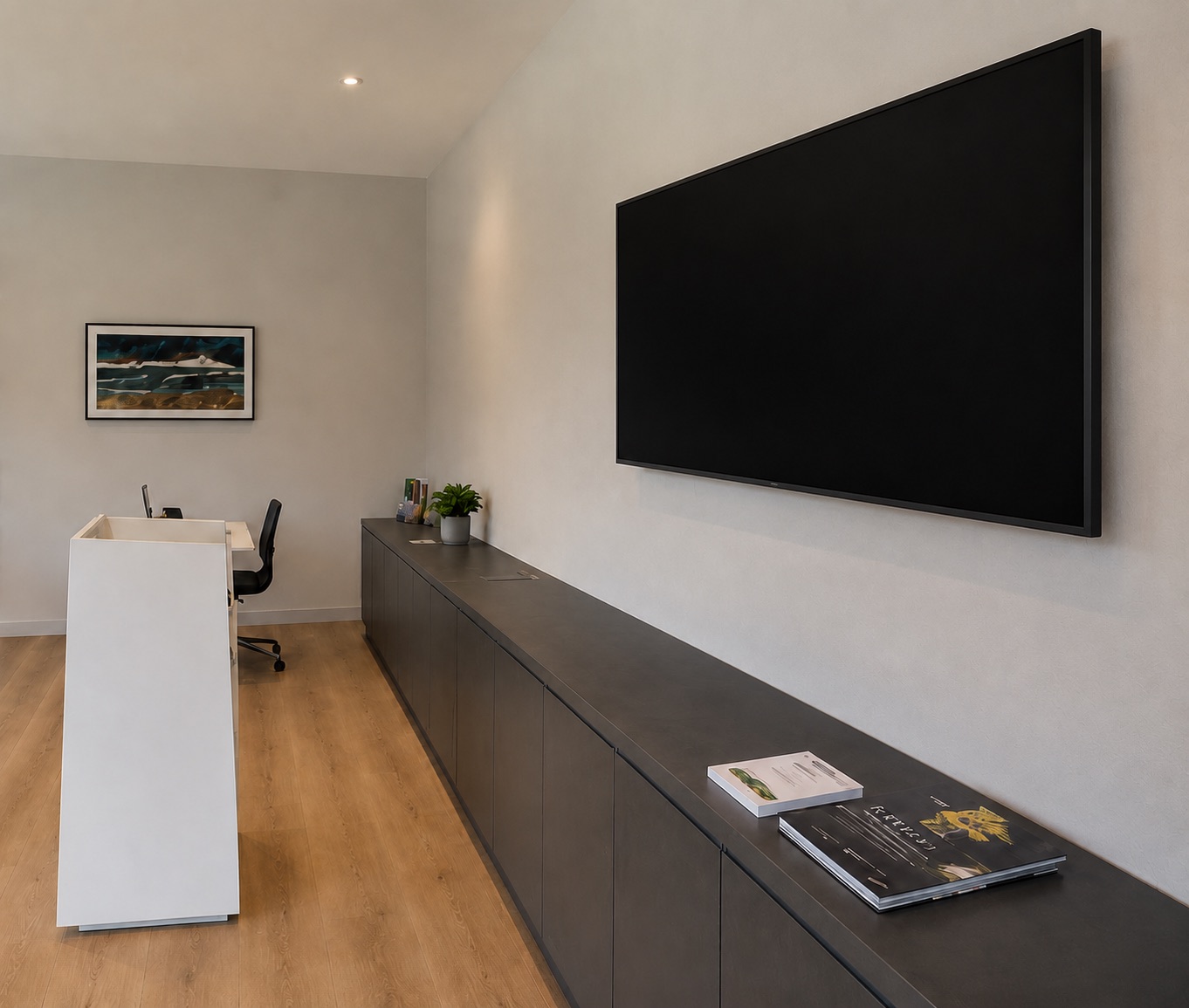 Reception with welcome desk and gallery wall